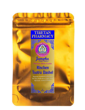 Rinchen Tsotru Dashel Pills in gold foil packaging with Tibetan Pharmacy branding, ideal for detox and health support. Buy online for herbal wellness.